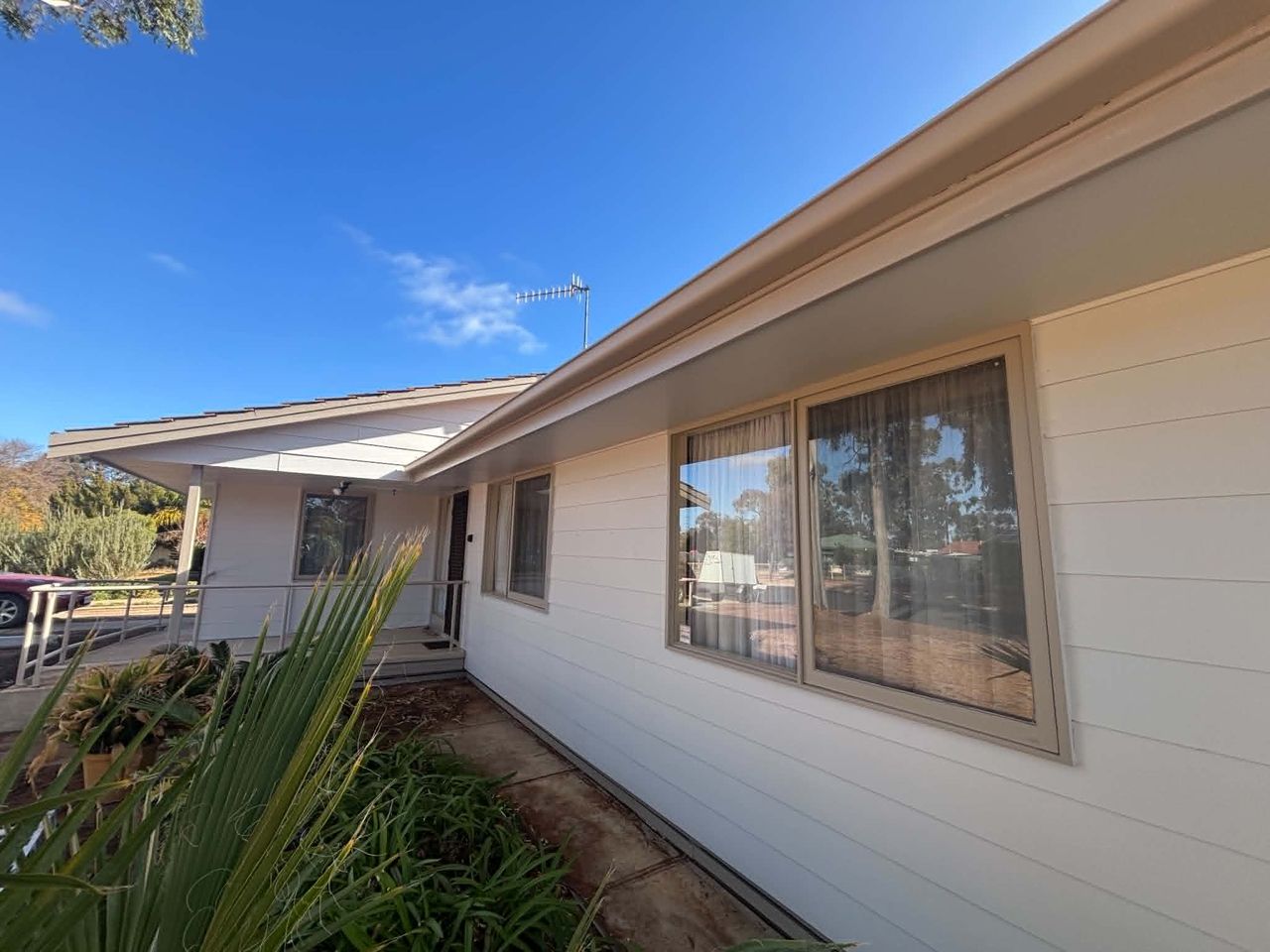 Crisp exterior repaint and trim